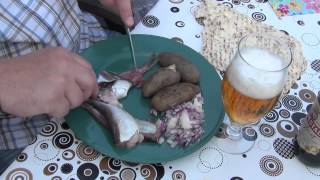 The traditional Swedish way to eat surströmming [upl. by Aerdnaid502]