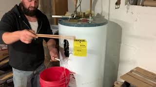 How to replace an electric water heater heating element [upl. by Kalman791]