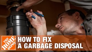 How to Fix a Garbage Disposal  The Home Depot [upl. by Ortensia]