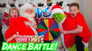 The Grinch vs Santa Claus Fortnite DANCE BATTLE [upl. by Annahahs]